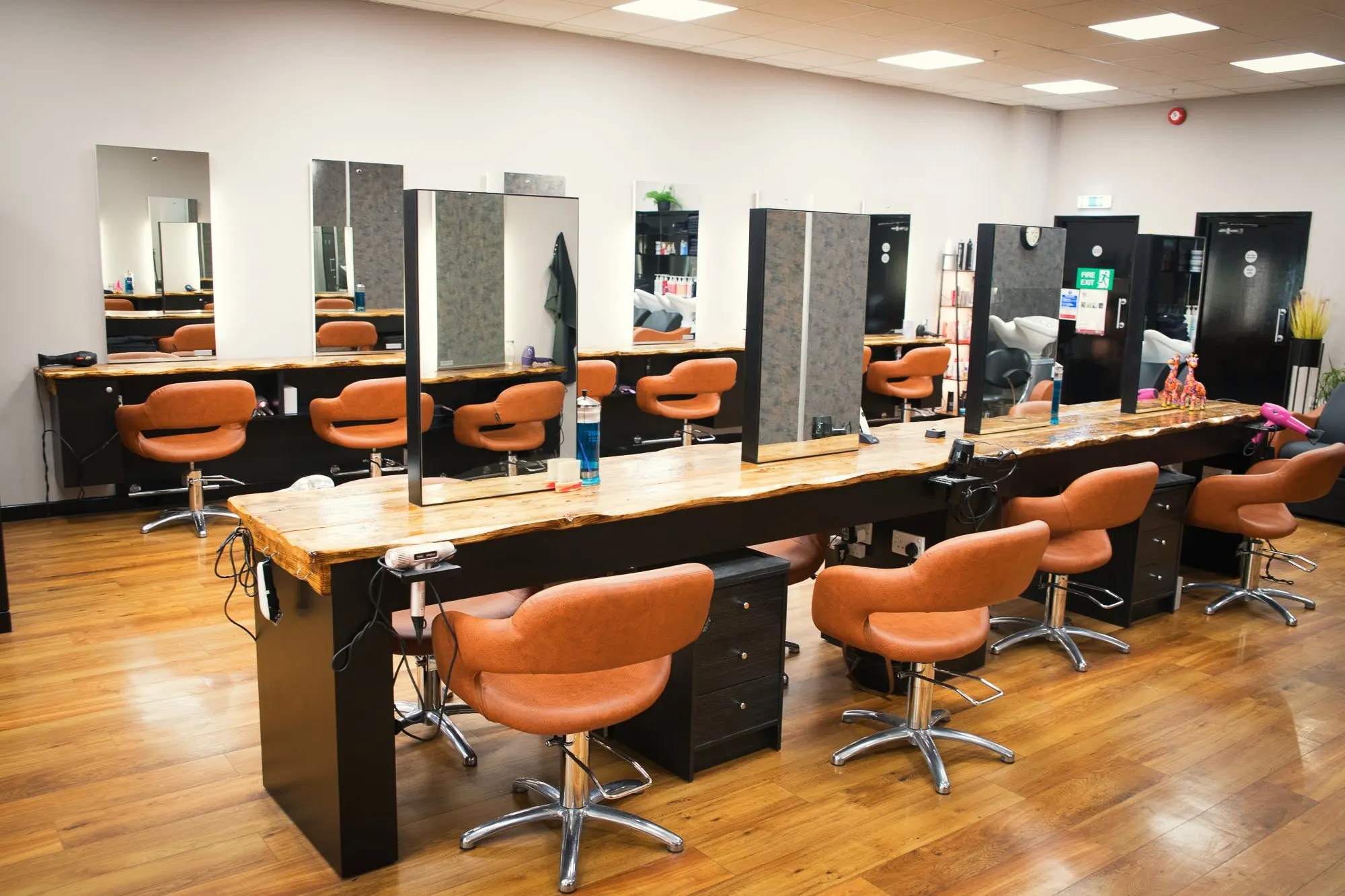 The styling stations and live-edge counter at Deesigner Hair Studio, Ipswich